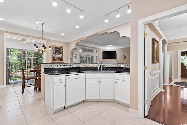 4495 Trotters Ct, Murrells Inlet, SC 29576 - kitchen featuring dishwasher, arched walkways, crown molding, white cabinets, and a chandelier