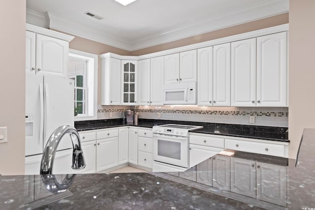 4495 Trotters Ct, Murrells Inlet, SC 29576 - kitchen featuring white appliances, dark stone countertops, white cabinetry, and ornamental molding