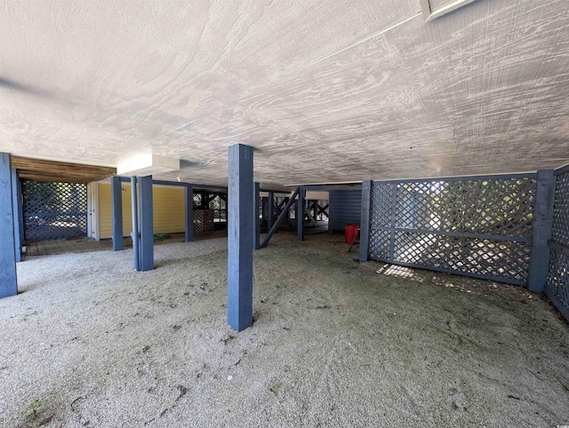 206 Atlantic Ave, Pawleys Island, SC 29585 - below grade area featuring carpet flooring