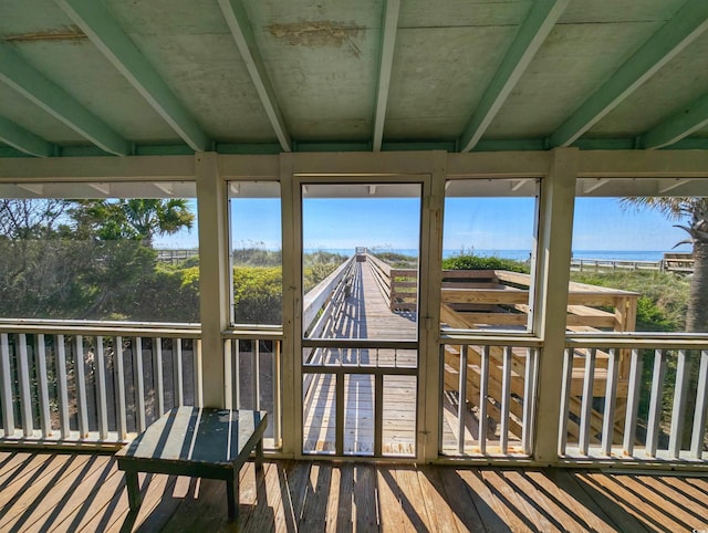 206 Atlantic Ave, Pawleys Island, SC 29585 - unfurnished sunroom featuring a water view and healthy amount of natural light