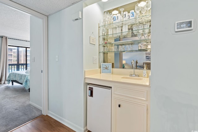 212 N 2nd Ave N Unit 162, North Myrtle Beach, SC 29582 - indoor wet bar with wood finished floors and refrigerator