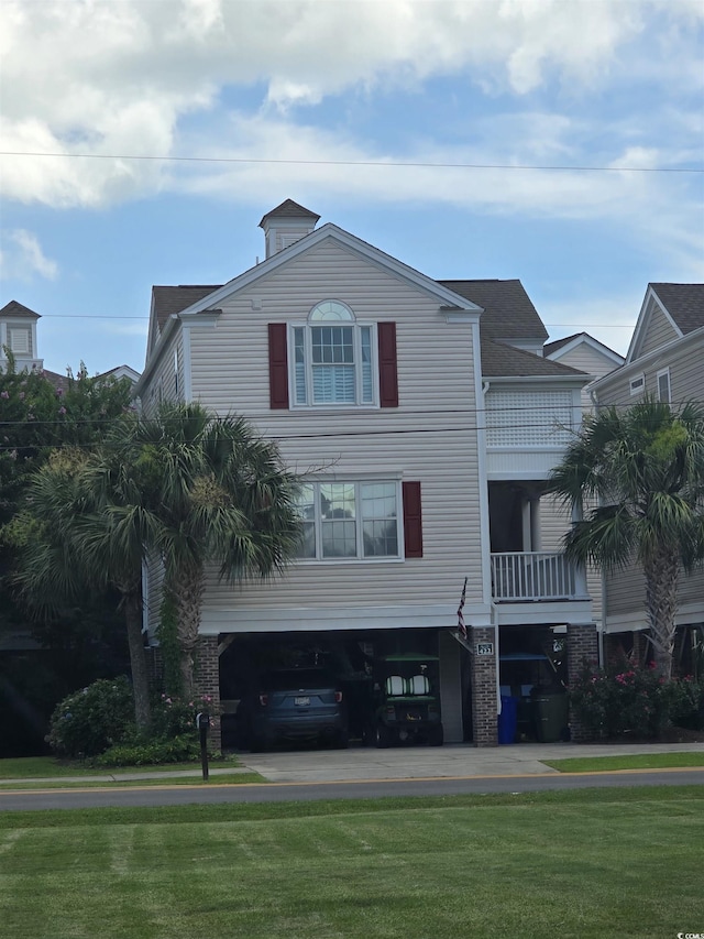422 S 3rd Ave, Surfside Beach, SC 29575 - view of front of house featuring a front lawn