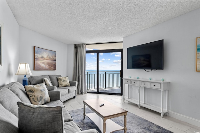 205 74th Ave N Unit 1809, Myrtle Beach, SC 29572 - living area featuring floor to ceiling windows and a textured ceiling