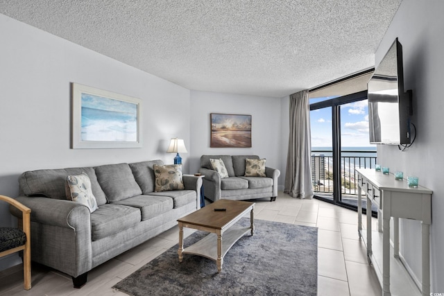 205 74th Ave N Unit 1809, Myrtle Beach, SC 29572 - living area featuring floor to ceiling windows and a textured ceiling