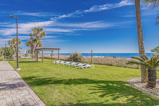 205 74th Ave N Unit 1809, Myrtle Beach, SC 29572 - view of green lawn featuring a pergola and a water view