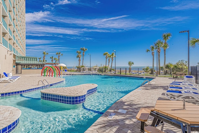 205 74th Ave N Unit 1809, Myrtle Beach, SC 29572 - community pool with a patio area