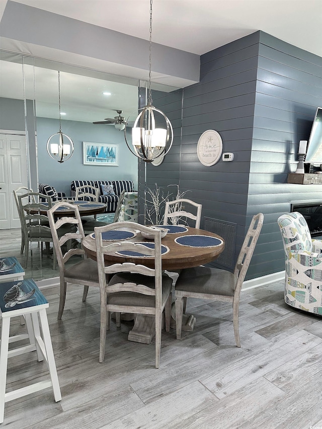 435 Ocean Creek Dr Unit 2731, Myrtle Beach, SC 29572 - dining room with a chandelier and wood finished floors
