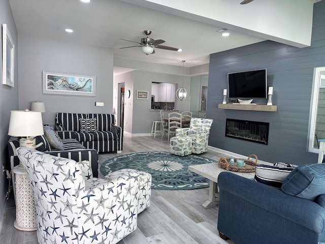 435 Ocean Creek Dr Unit 2731, Myrtle Beach, SC 29572 - living room featuring a ceiling fan, light wood-type flooring, recessed lighting, and a large fireplace