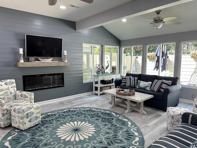 435 Ocean Creek Dr Unit 2731, Myrtle Beach, SC 29572 - living area with ceiling fan, wood finished floors, a large fireplace, wood walls, and recessed lighting