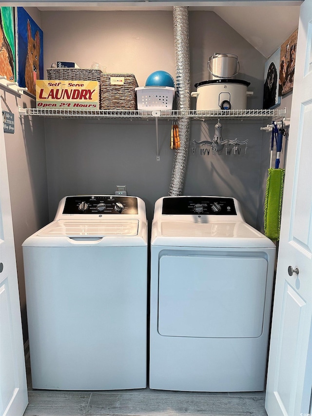 435 Ocean Creek Dr Unit 2731, Myrtle Beach, SC 29572 - laundry area with washer and dryer and wood finished floors