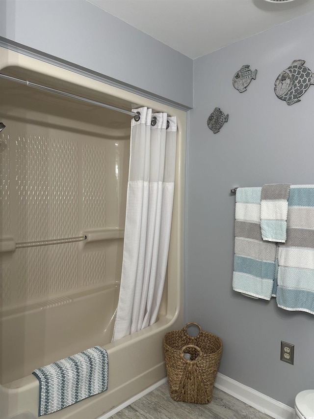 435 Ocean Creek Dr Unit 2731, Myrtle Beach, SC 29572 - full bath featuring shower / bath combo with shower curtain and wood finished floors