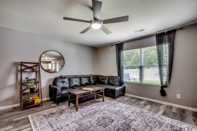 780 Trap Shooter Cir, Longs, SC 29568 - living area featuring ceiling fan and wood finished floors