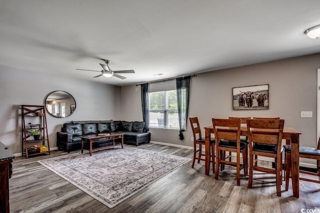 780 Trap Shooter Cir, Longs, SC 29568 - living area with a ceiling fan and wood finished floors