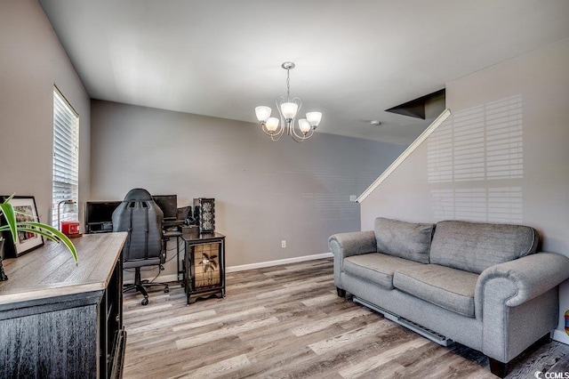 780 Trap Shooter Cir, Longs, SC 29568 - office area featuring light wood-style floors and a chandelier