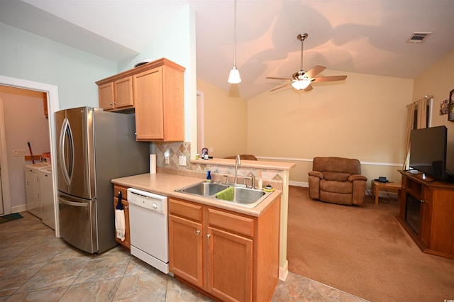 205 Cupola Dr, Longs, SC 29568 - kitchen with dishwasher, independent washer and dryer, vaulted ceiling, a ceiling fan, and light brown cabinets
