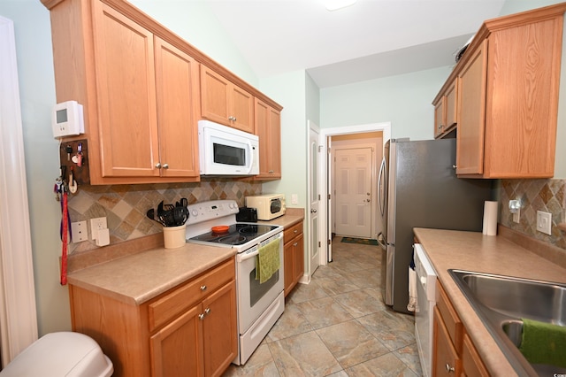 205 Cupola Dr, Longs, SC 29568 - kitchen featuring white appliances, decorative backsplash, light countertops, and light stone finish flooring