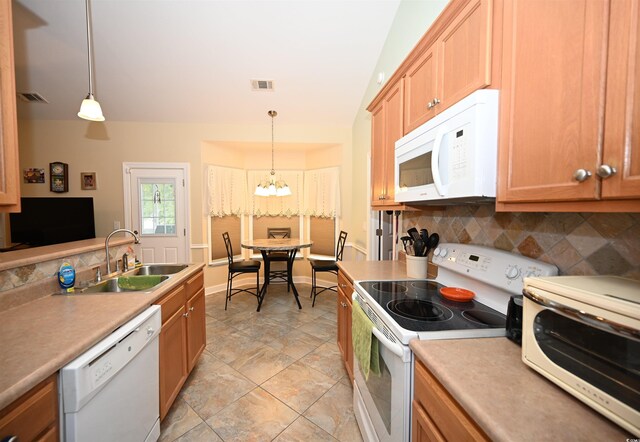 205 Cupola Dr, Longs, SC 29568 - kitchen with white appliances, decorative backsplash, a chandelier, hanging light fixtures, and light countertops