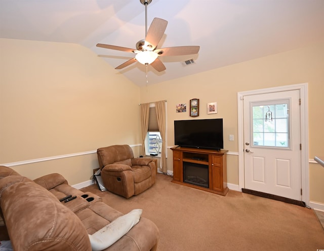 205 Cupola Dr, Longs, SC 29568 - living room featuring vaulted ceiling, a ceiling fan, light colored carpet, and a fireplace