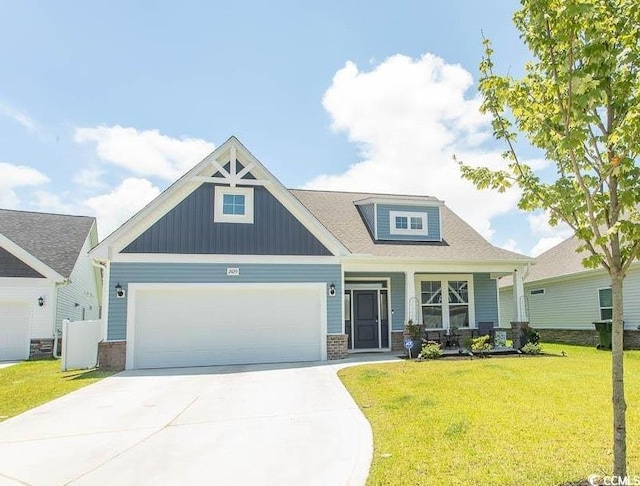 2429 Campton Loop, Conway, SC 29527 - craftsman house featuring an attached garage, concrete driveway, a front yard, and board and batten siding
