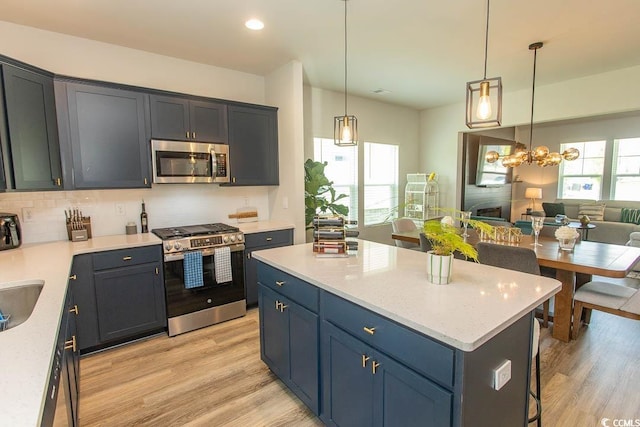 2429 Campton Loop, Conway, SC 29527 - kitchen with stainless steel appliances, light wood-style flooring, a kitchen island, open floor plan, and recessed lighting