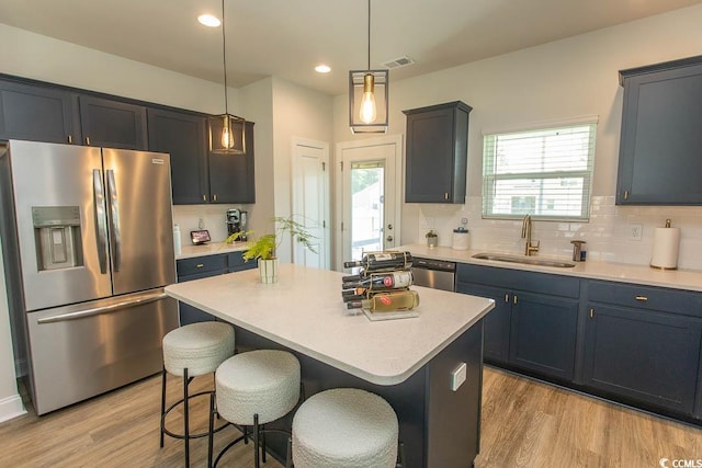 2429 Campton Loop, Conway, SC 29527 - kitchen with appliances with stainless steel finishes, tasteful backsplash, light wood-style flooring, and recessed lighting