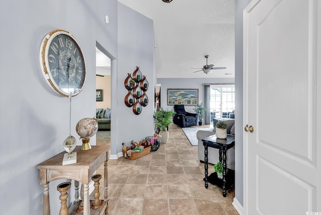 7977 Leeward Ln, Murrells Inlet, SC 29576 - hallway with baseboards and stone finish floors