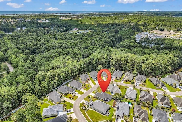 7977 Leeward Ln, Murrells Inlet, SC 29576 - aerial view of property and surrounding area with a heavily wooded area and nearby suburban area