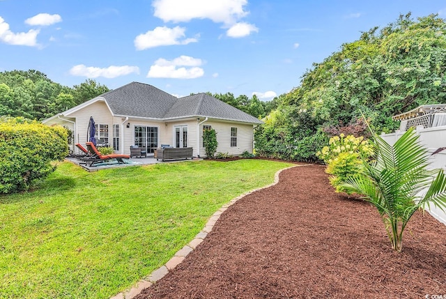 7977 Leeward Ln, Murrells Inlet, SC 29576 - rear view of property featuring an outdoor living space, a lawn, and a patio