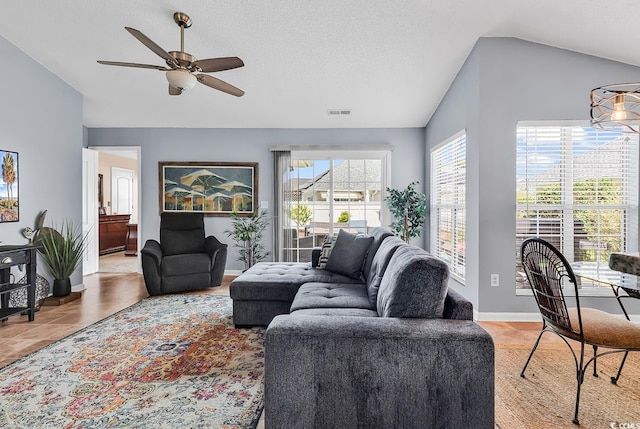7977 Leeward Ln, Murrells Inlet, SC 29576 - living room featuring vaulted ceiling and ceiling fan