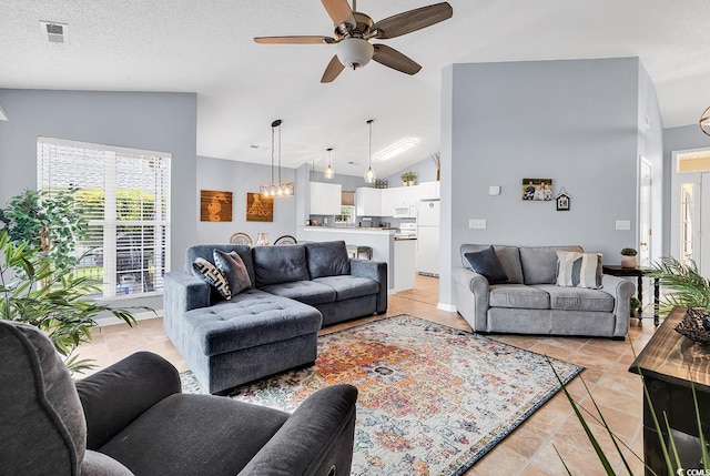 7977 Leeward Ln, Murrells Inlet, SC 29576 - living room with lofted ceiling, ceiling fan, and light tile patterned floors