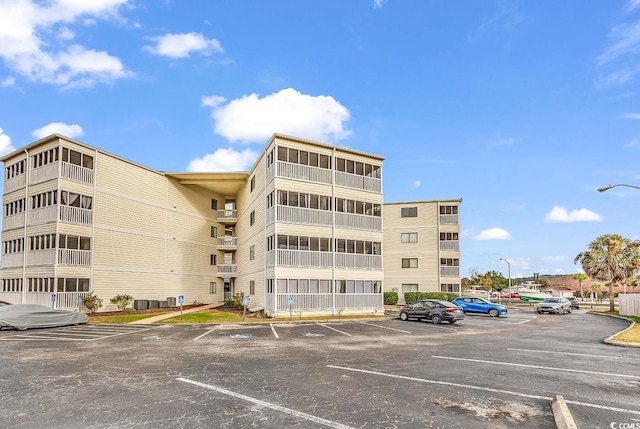 4350 Intracoastal Dr Unit 1403, Little River, SC 29566 - view of apartment building / complex with uncovered parking