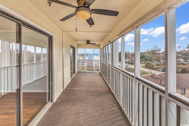4350 Intracoastal Dr Unit 1403, Little River, SC 29566 - unfurnished sunroom featuring a ceiling fan