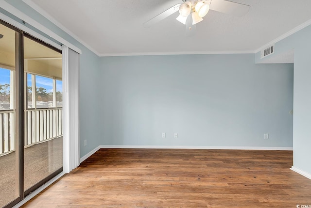 4350 Intracoastal Dr Unit 1403, Little River, SC 29566 - spare room featuring ornamental molding, wood finished floors, and a ceiling fan