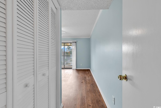 4350 Intracoastal Dr Unit 1403, Little River, SC 29566 - corridor with a textured ceiling, crown molding, and wood finished floors