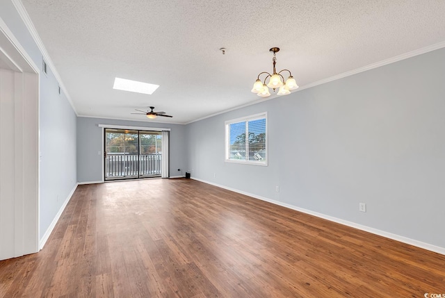 4350 Intracoastal Dr Unit 1403, Little River, SC 29566 - empty room with ornamental molding, a skylight, wood finished floors, a textured ceiling, and a chandelier