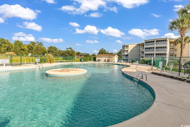4350 Intracoastal Dr Unit 1403, Little River, SC 29566 - community pool with a patio area