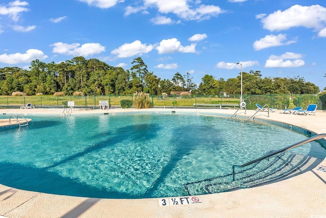4350 Intracoastal Dr Unit 1403, Little River, SC 29566 - community pool with a patio area