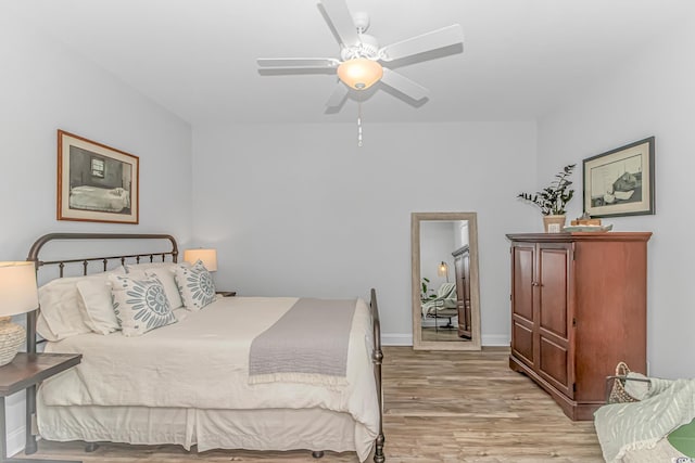 143 Enclave Pl, Pawleys Island, SC 29585 - bedroom with wood finished floors and ceiling fan