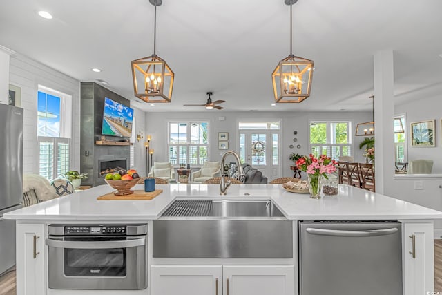 143 Enclave Pl, Pawleys Island, SC 29585 - kitchen featuring open floor plan, a chandelier, stainless steel appliances, recessed lighting, and light countertops