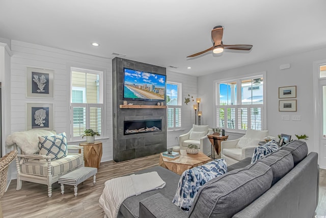 143 Enclave Pl, Pawleys Island, SC 29585 - living room with a fireplace, wood finished floors, ceiling fan, and recessed lighting