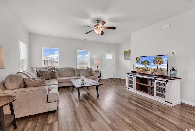 1404 Bellaria Way, Myrtle Beach, SC 29579 - living area with a ceiling fan, wood finished floors, and healthy amount of natural light