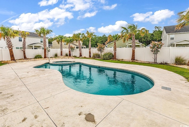1404 Bellaria Way, Myrtle Beach, SC 29579 - view of swimming pool featuring a patio area, a fenced backyard, a residential view, and a pool with connected hot tub