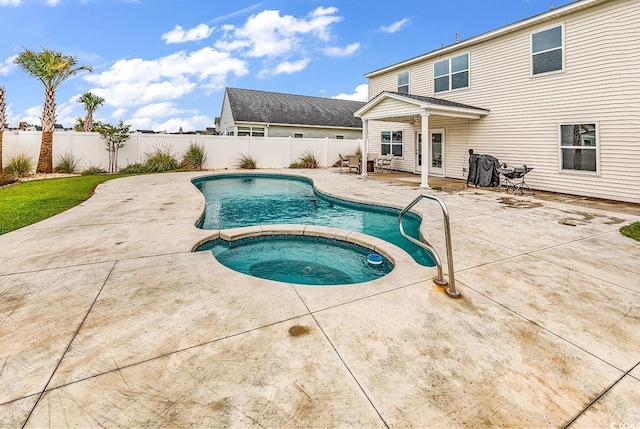 1404 Bellaria Way, Myrtle Beach, SC 29579 - view of swimming pool featuring a patio area, a fenced backyard, and a pool with connected hot tub