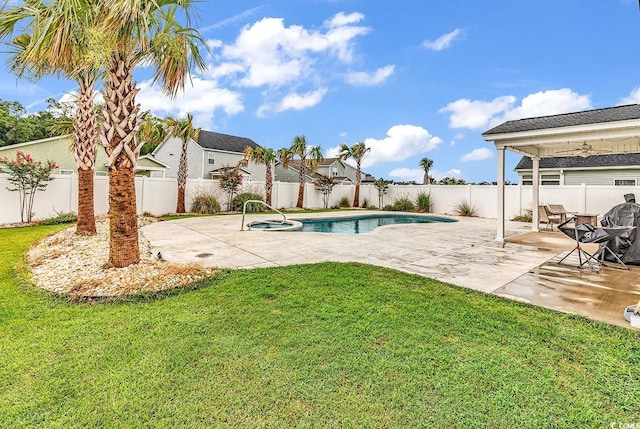 1404 Bellaria Way, Myrtle Beach, SC 29579 - view of swimming pool featuring a fenced backyard, a patio, ceiling fan, and a pool with connected hot tub
