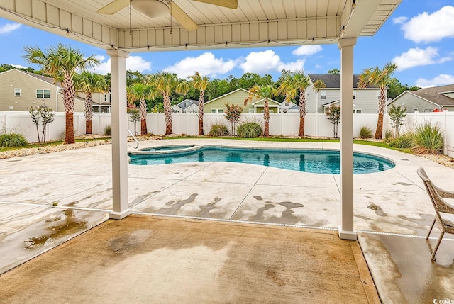 1404 Bellaria Way, Myrtle Beach, SC 29579 - view of swimming pool featuring a ceiling fan, an in-ground hot tub, a patio area, a fenced backyard, and a residential view