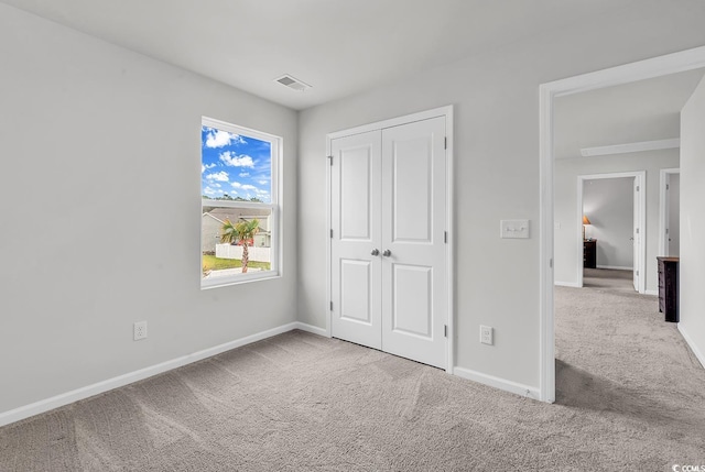 1404 Bellaria Way, Myrtle Beach, SC 29579 - unfurnished bedroom featuring carpet flooring and a closet