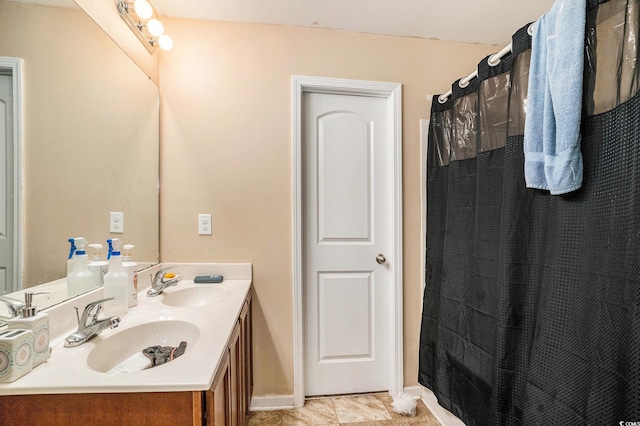 912 Clay Pigeon Ct, Longs, SC 29568 - bathroom with double vanity and tile patterned flooring