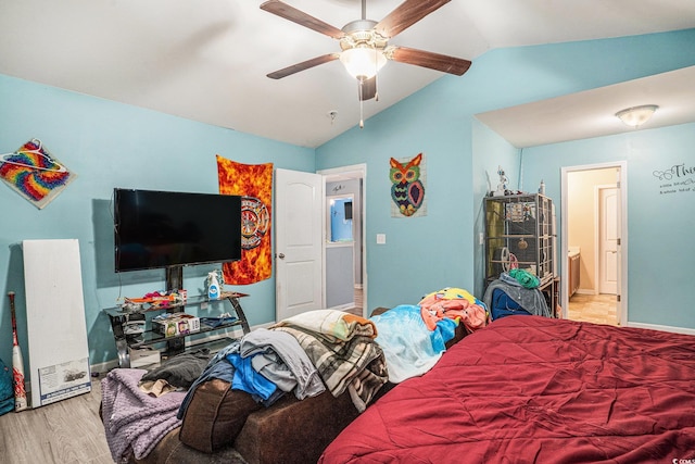 912 Clay Pigeon Ct, Longs, SC 29568 - bedroom featuring vaulted ceiling, light wood-style flooring, and a ceiling fan