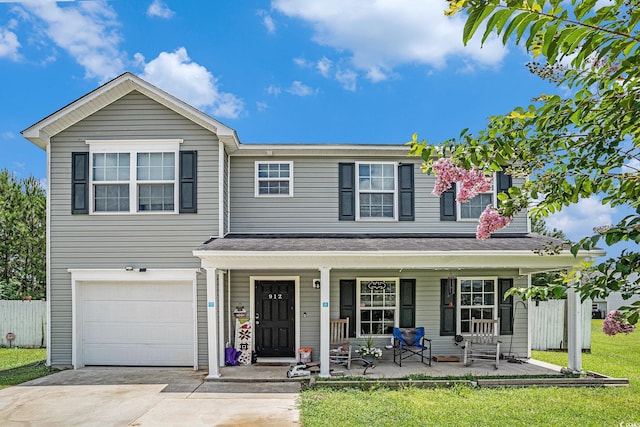 912 Clay Pigeon Ct, Longs, SC 29568 - view of front facade featuring a porch, a garage, and driveway