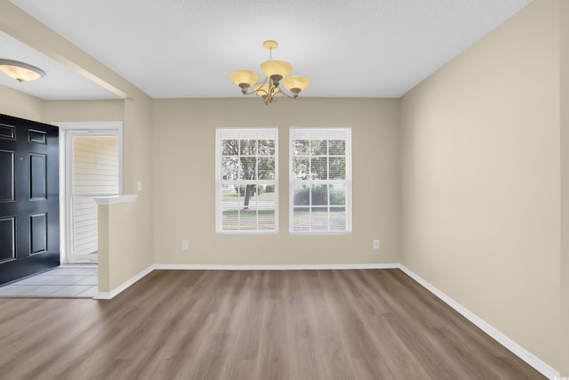428 Bellegrove Dr, Myrtle Beach, SC 29577 - foyer entrance with a chandelier and wood finished floors